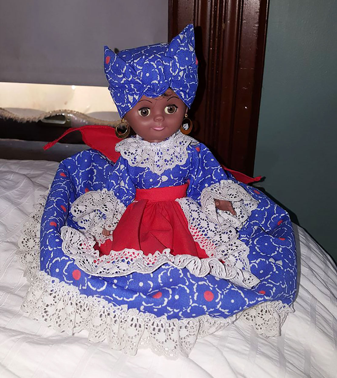Candelo found this beautiful doll at one of the Denver Thrift Shops photo by Candelo Kimbisa