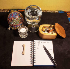 Bone set, water glass and candle